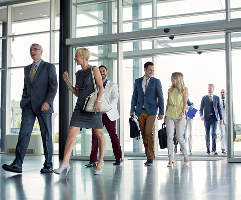 Office workers entering building
